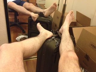 Feet on Luggage